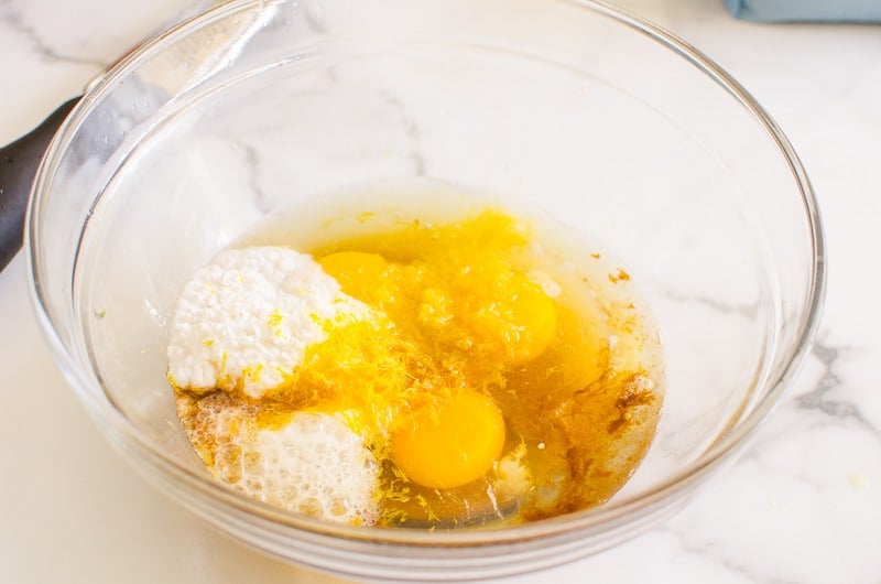 eggs, maple syrup and baking powder and baking soda in a glass bowl