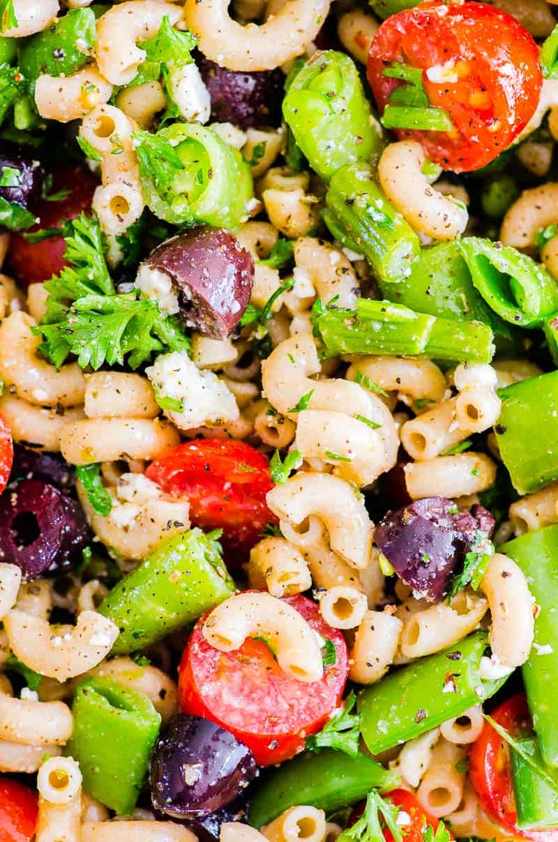 Closeup of healthy pasta salad recipe with veggies.