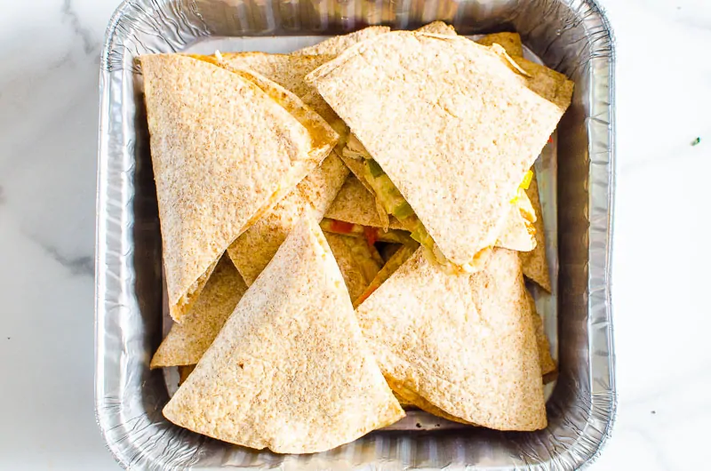 cut up Chicken Quesadillas in a tray