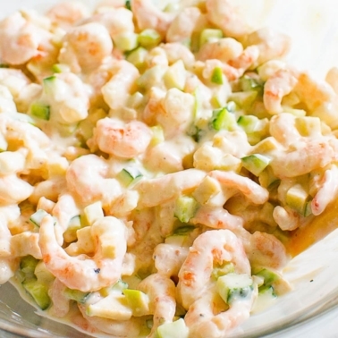 Healthy shrimp salad with Greek yogurt dressing in a bowl.