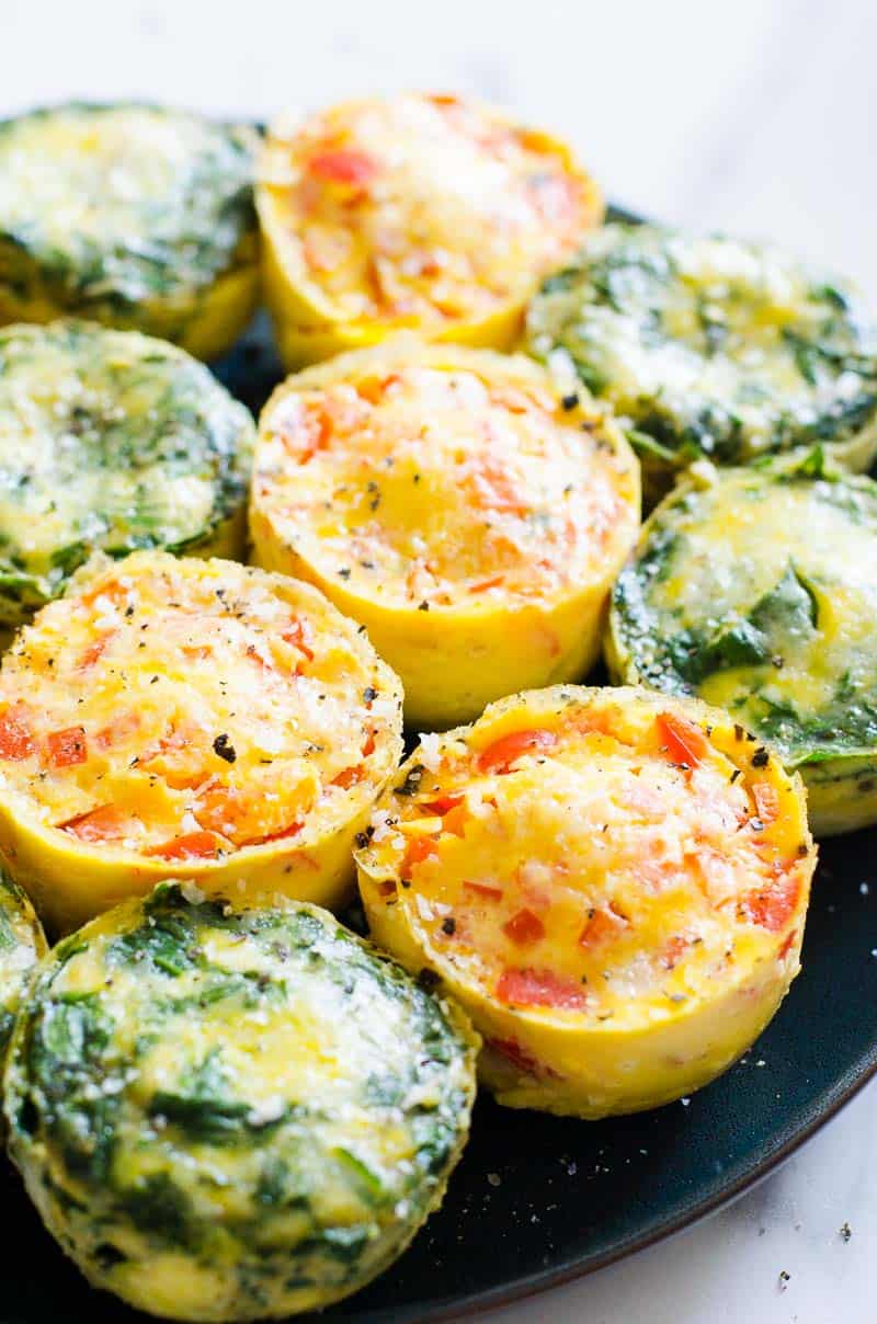 Instant pot egg bites with pepper and spinach on a plate.