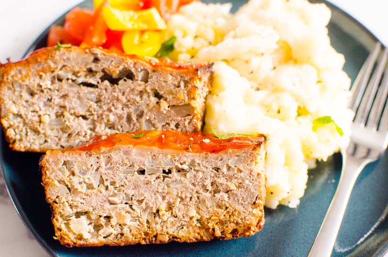 turkey meatloaf on a plate with potatoes