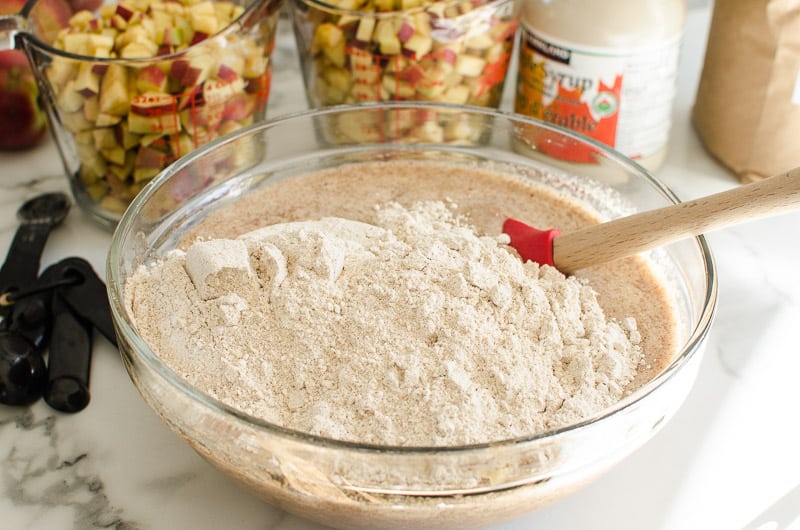 Flour added to bowl of liquid quick bread batter.
