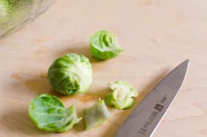 trimmed brussels sprouts with a knife