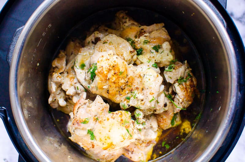 instant pot chicken thighs garnished with dill