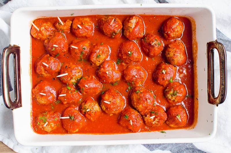 instant pot meatballs with tomato sauce in baking dish for serving