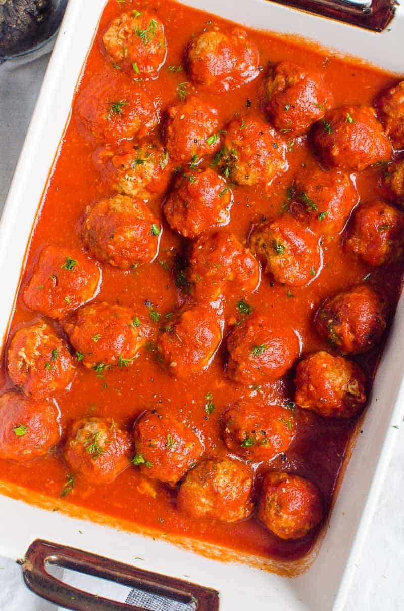 Instant Pot Meatballs in sauce in baking dish for serving