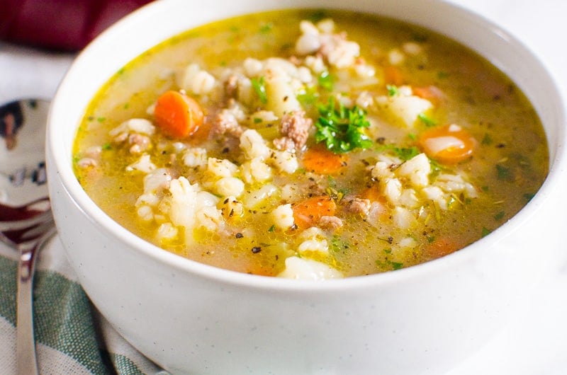 white bowl of beef barley soup