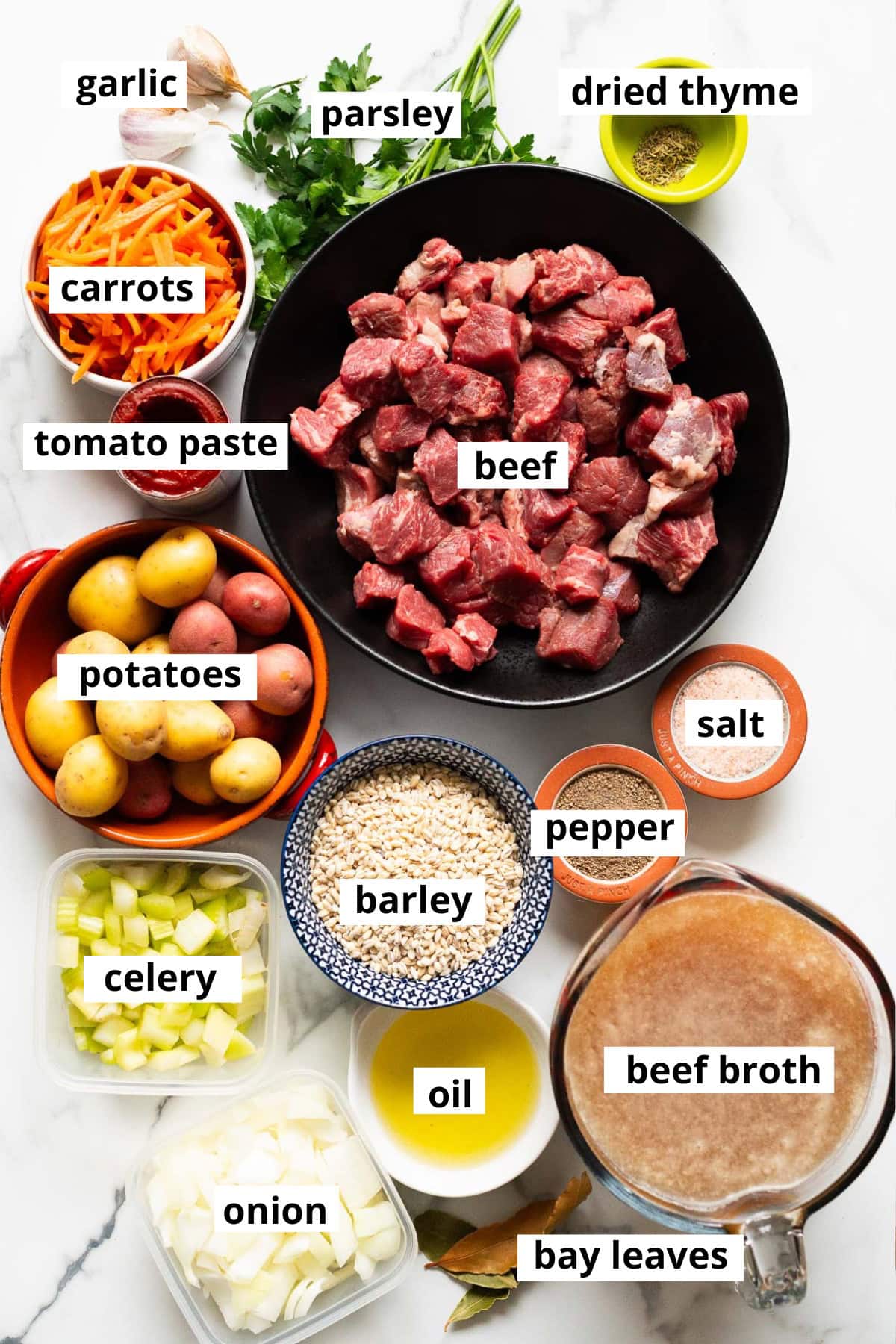 Beef, barley, carrots, onion, dried thyme, garlic, celery, tomato paste, parsley, potatoes, salt, pepper, oil, beef broth, bay leaves.