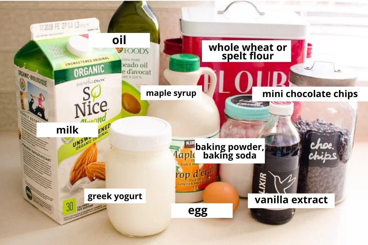 Almond milk, Greek yogurt, egg, baking powder, baking soda, vanilla, chocolate chips, maple syrup, oil, whole wheat flour.