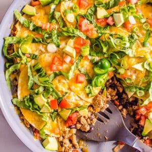 Taco skillet showing texture inside and spatula in it.