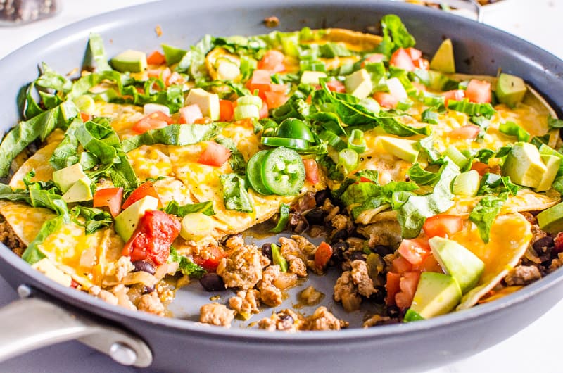 Taco skillet with ground turkey, cheese, avocado, cilantro and jalapeno.