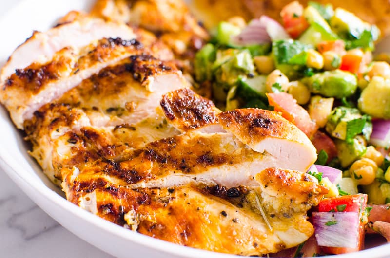 Grilled Chicken Breast served with chickpea salad