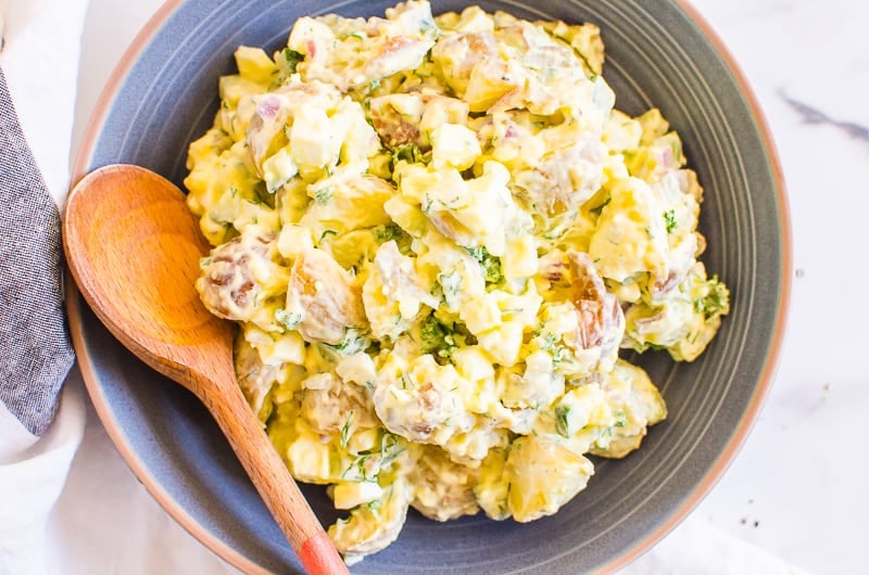 healthy potato salad in bowl ready to mix