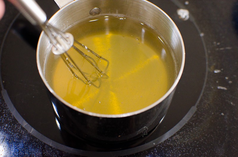 Melted gelatin in small pot with a whisk.