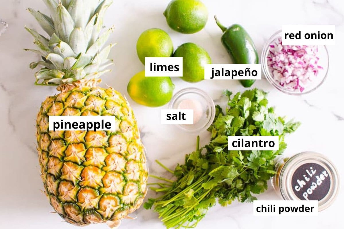 Pineapple, limes, jalapenos, cilantro, red onion, chili powder, salt.