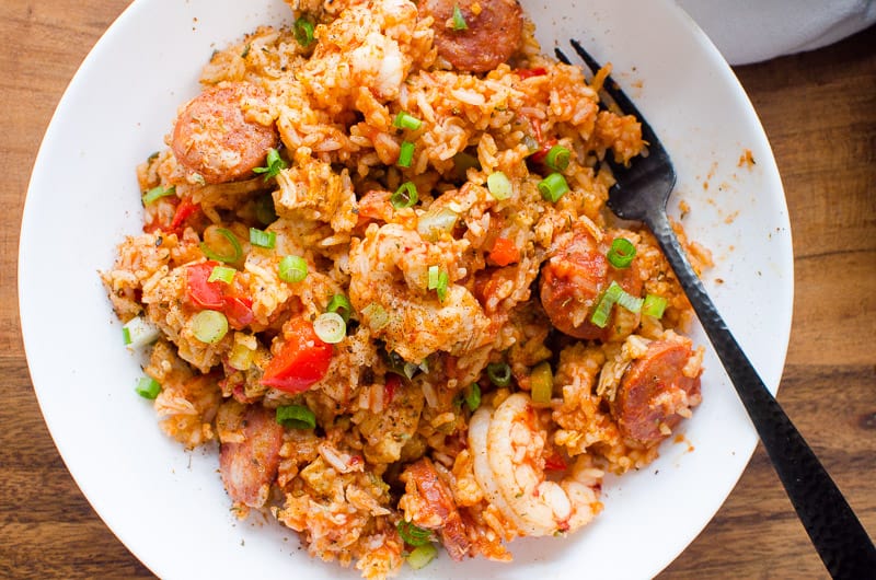 Instant Pot Jambalaya on white plate with black fork