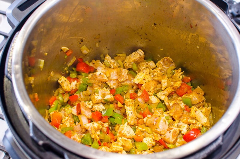 sauteed veggies, chicken and spices in instant pot