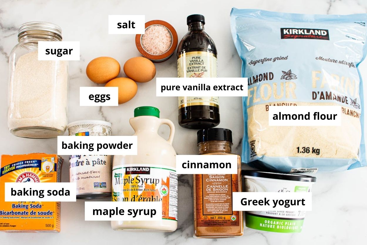 Almond flour, eggs, sugar, vanilla, salt, Greek yogurt, cinnamon, maple syrup, baking powder, baking soda.