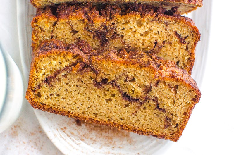 Slices of almond flour cinnamon bread on white plate.