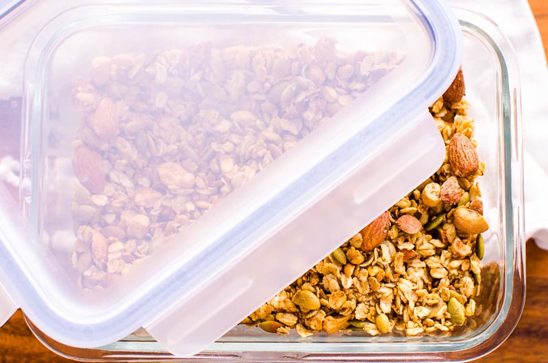 Healthy granola in glass container with lid.