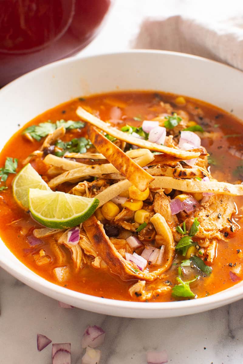 Chicken Tortilla Soup with lime and tortilla strips