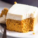 Healthy pumpkin cake on a plate with fork.