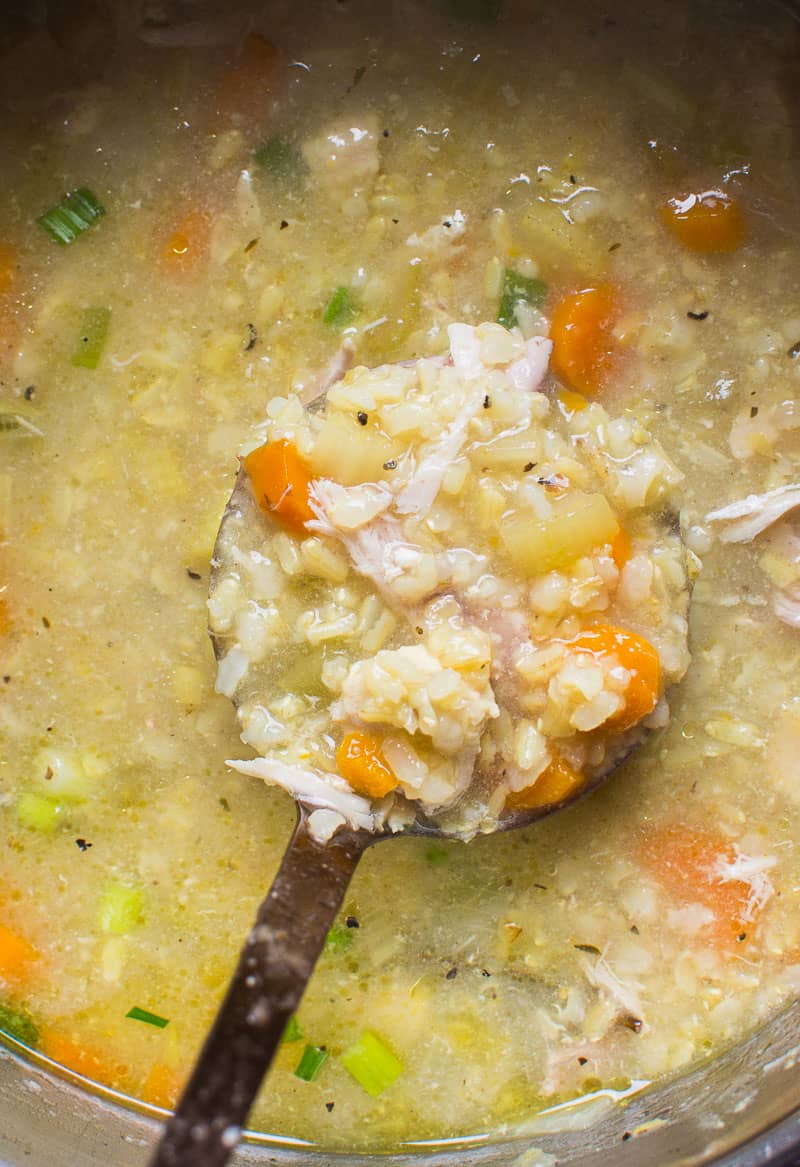 Instant Pot Chicken and Rice Soup on a ladle.