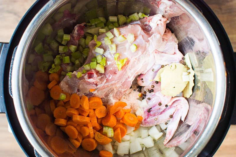 carrots, celery, onion and chicken carcass to make Instant Pot Chicken Stock