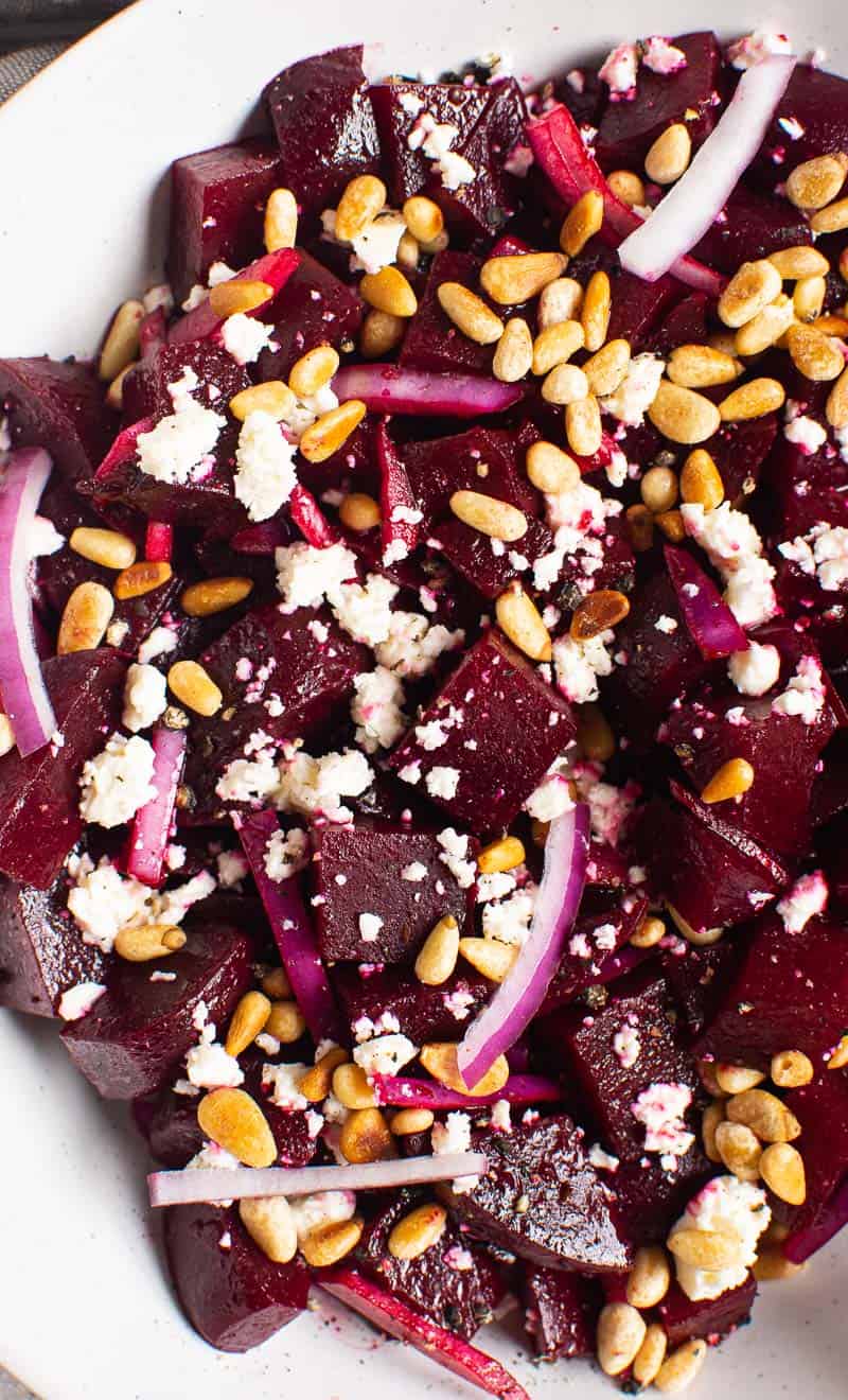 Roasted Beets with Goat Cheese, red onion and Pine Nuts