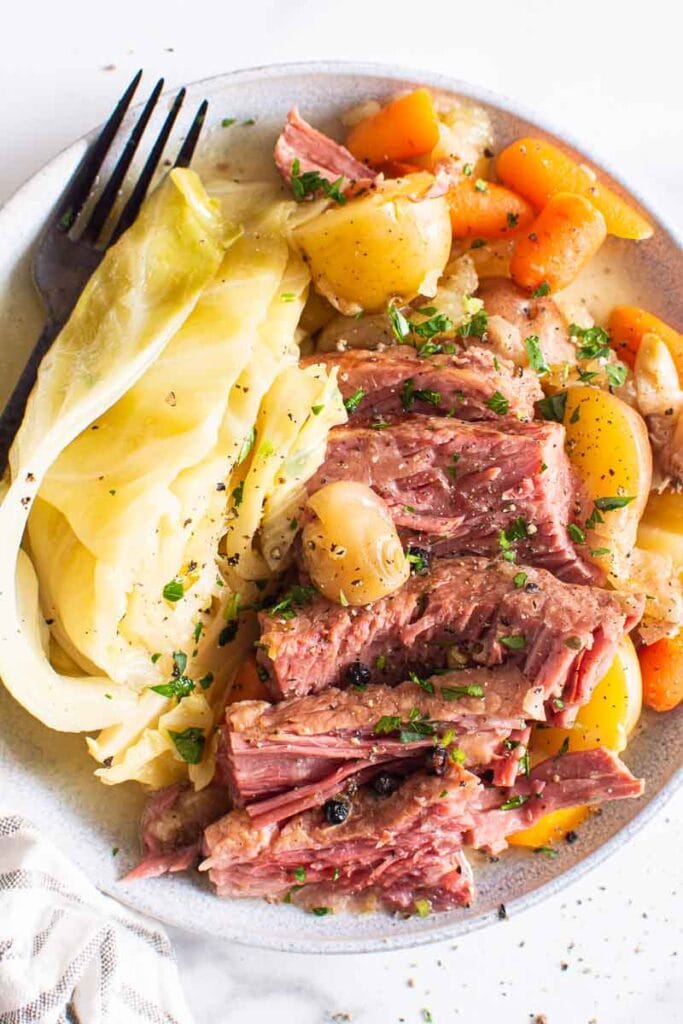 Instant Pot corned beef with cabbage, potatoes and carrots.