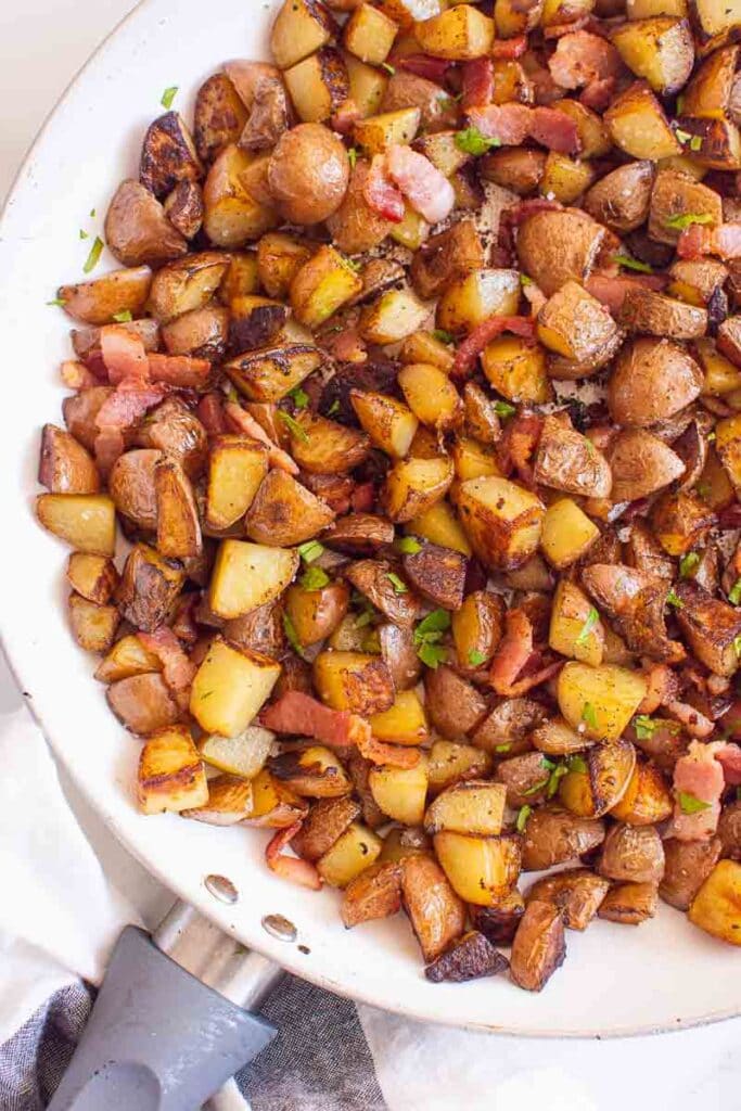 Ukrainian breakfast potatoes in skillet.