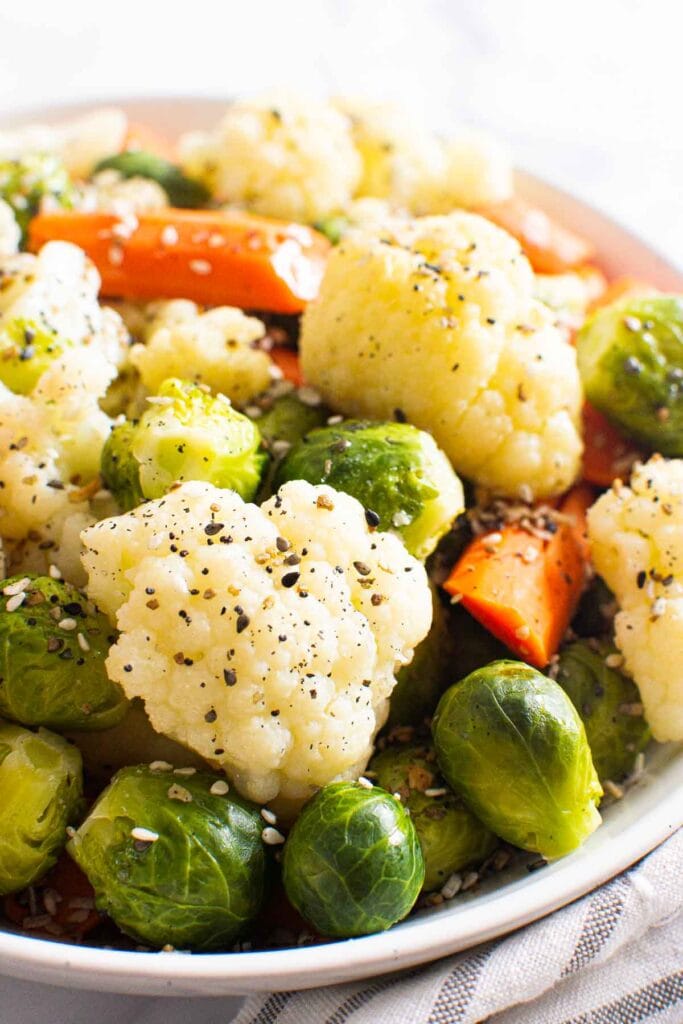 steamed veggies with seasoning on a plate
