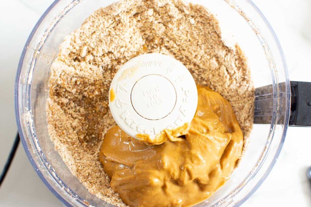 oats, almonds and peanut butter in a food processor