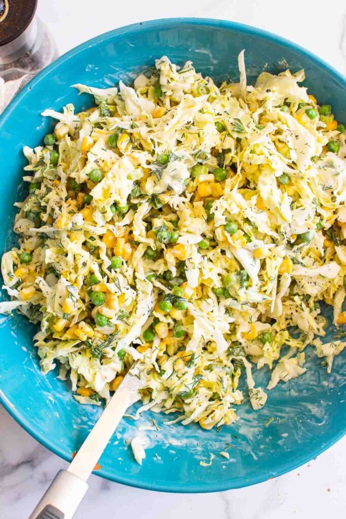 savoy cabbage salad with peas, corn and ranch dressing