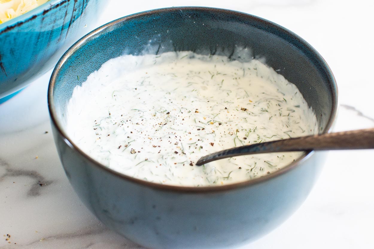 healthy ranch dressing in bowl with fork