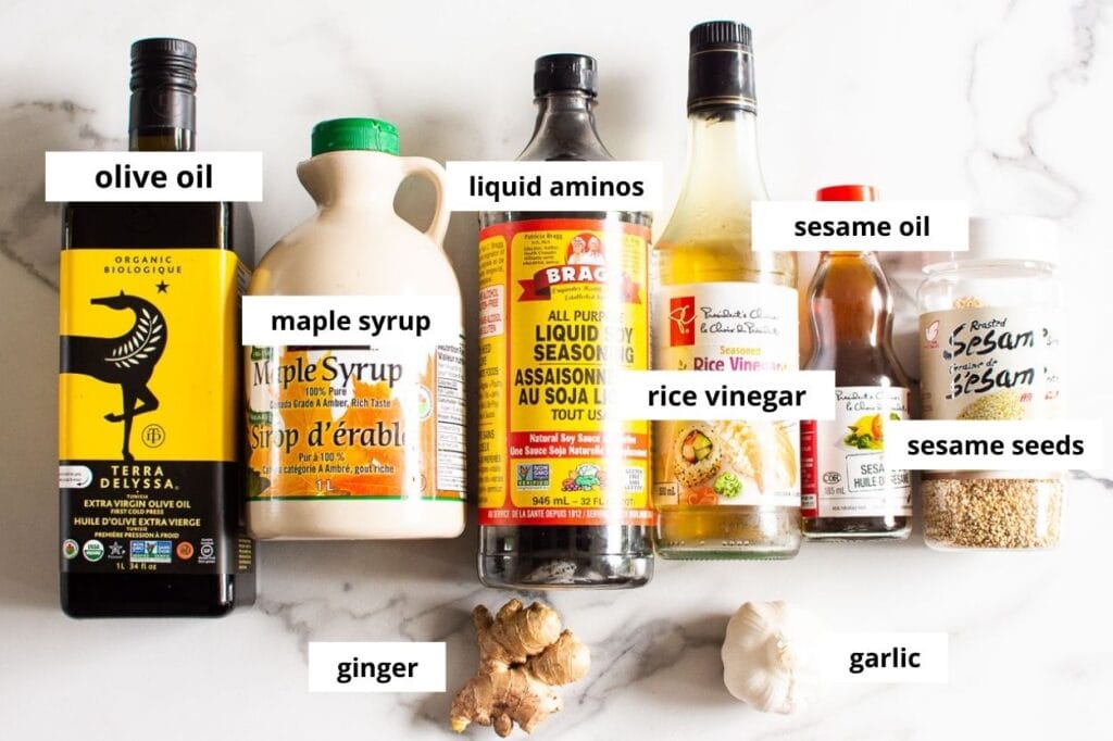 liquid aminos, maple syrup, rice vinegar, sesame oil, ginger, garlic, olive oil and sesame seeds.