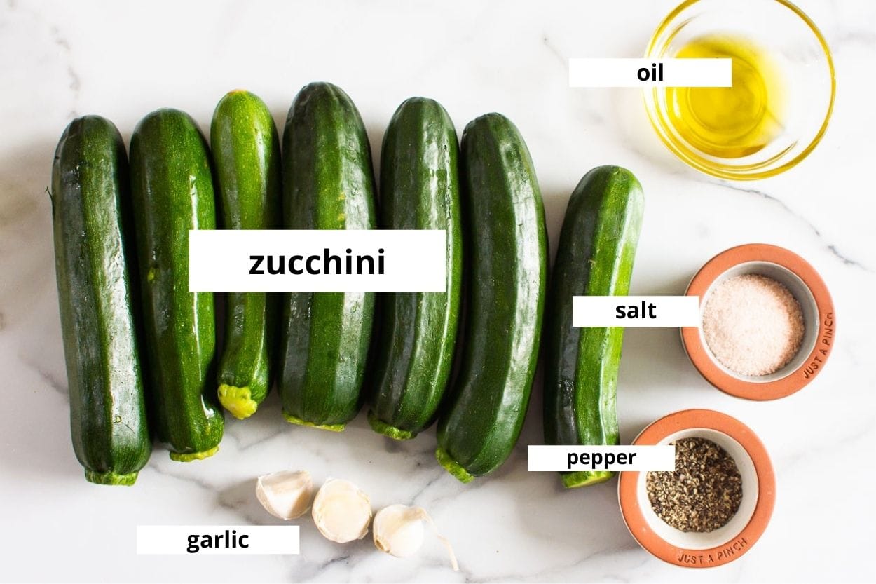 Zucchini, garlic cloves, oil, salt and pepper.