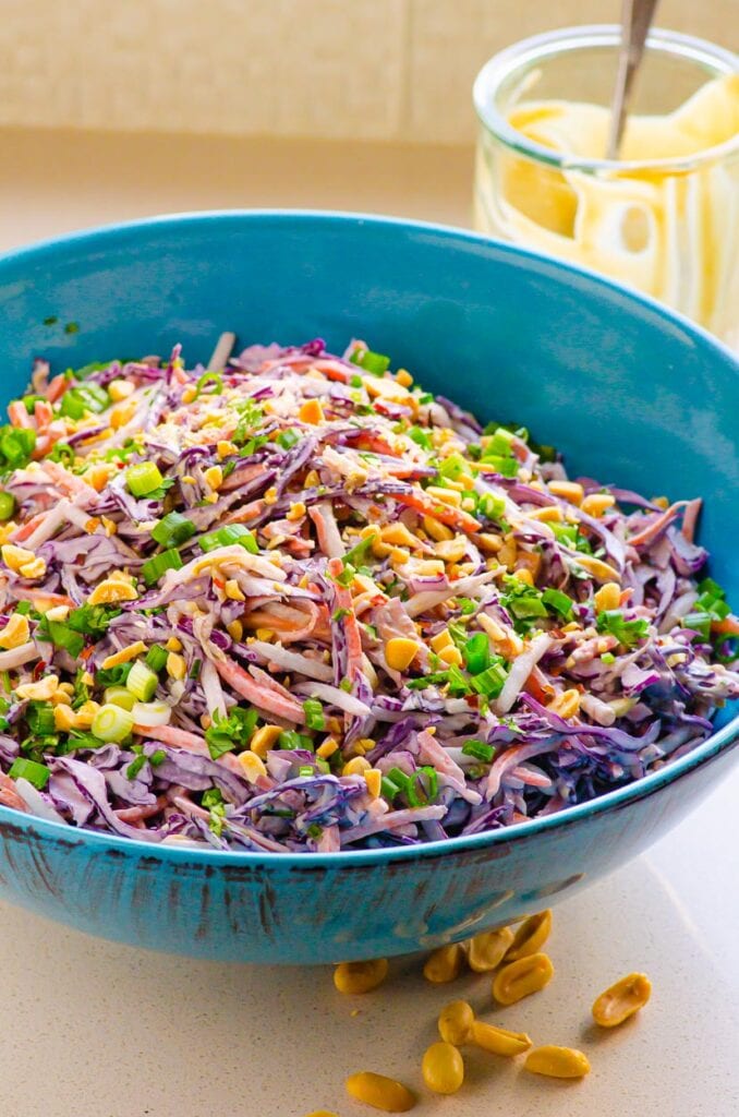 Peanut slaw in a blue bowl.