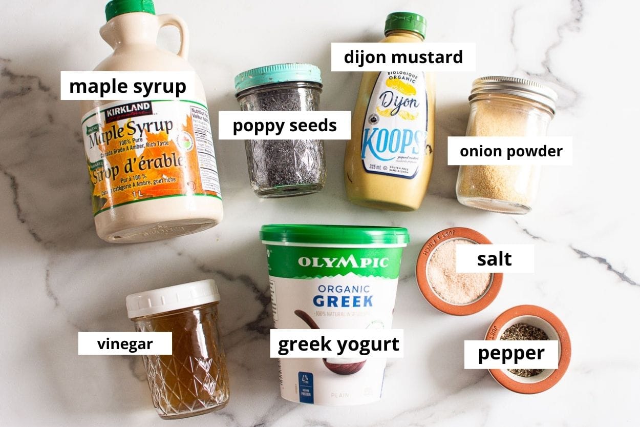 Greek yogurt, maple syrup, poppy seeds, apple cider vinegar, dijon mustard, and onion powder.
