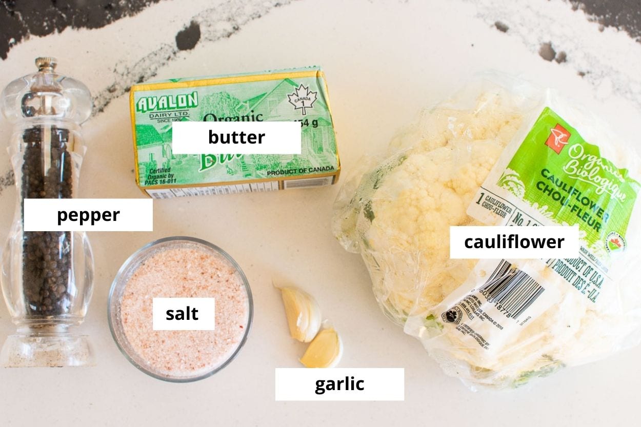 Head of cauliflower, garlic, butter, salt and pepepr.