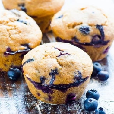 Four healthy blueberry muffins.