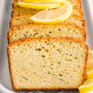 healthy lemon zucchini bread with lemon slices on top