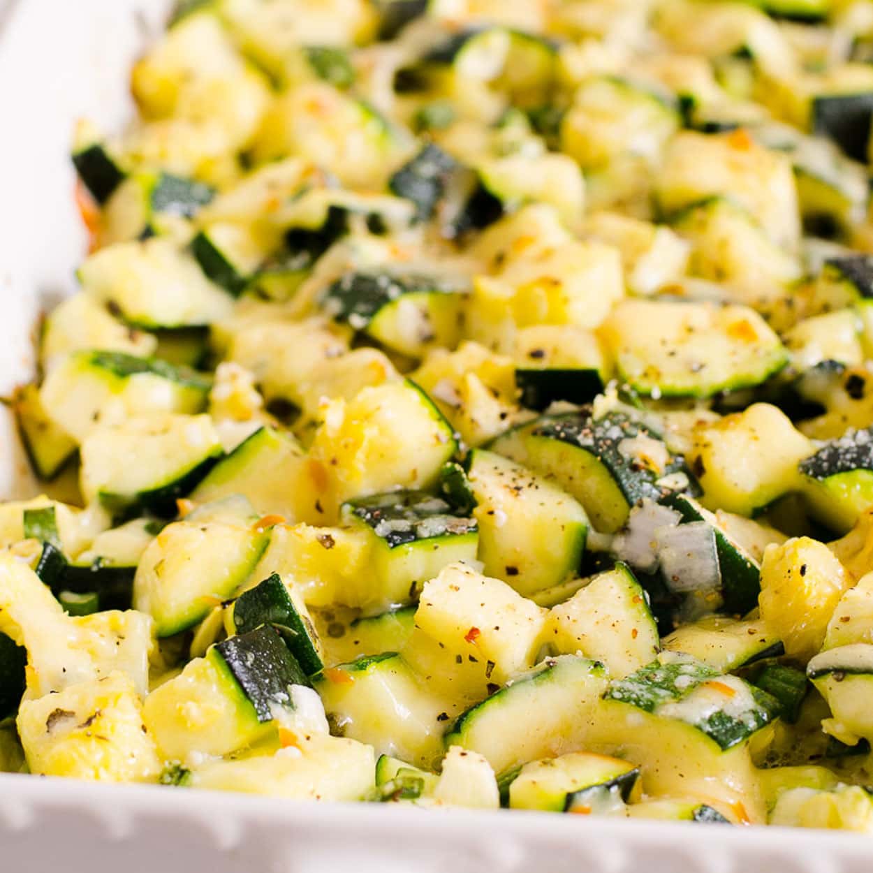Healthy zucchini casserole in baking dish.