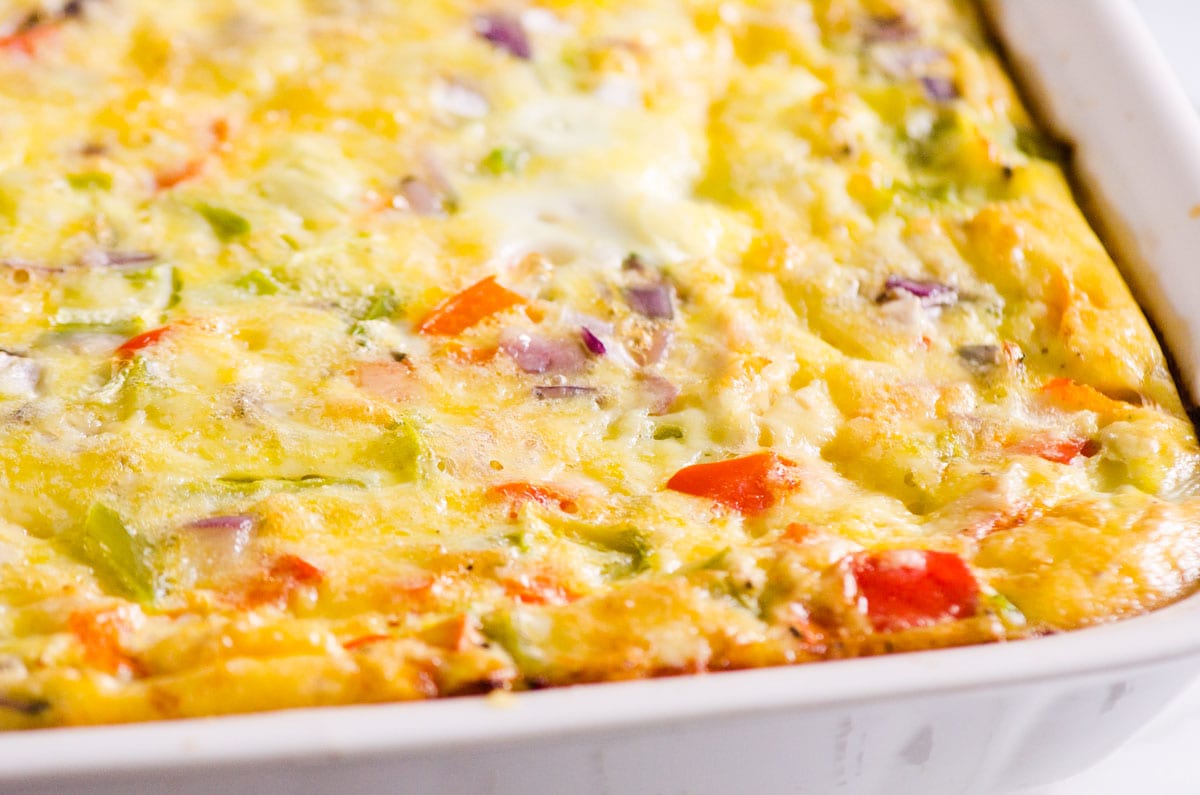 Closeup of healthy egg bake with potatoes, bell peppers and red onion.
