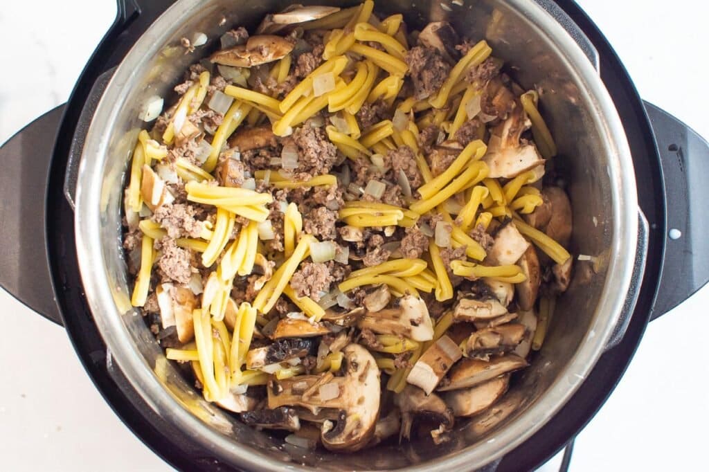 add mushrooms and pasta for instant pot beef recipe