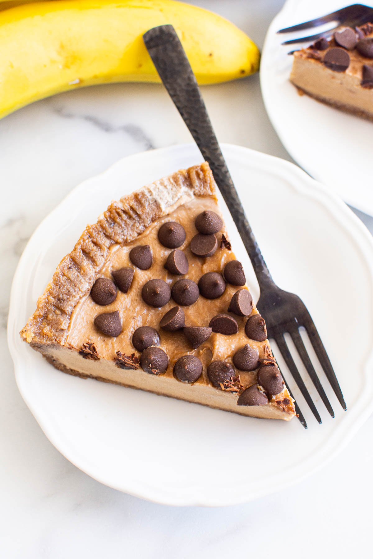 A slice of no bake peanut butter pie on a plate.