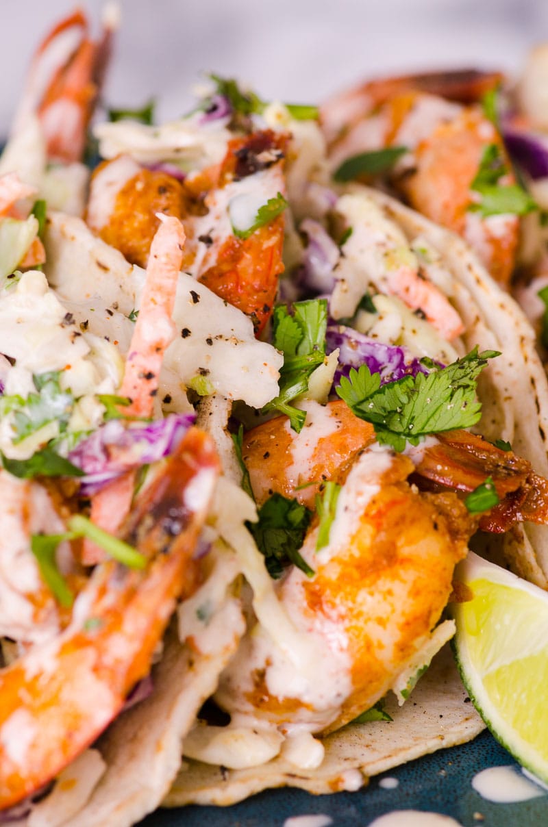 shrimp tacos with slaw on a plate
