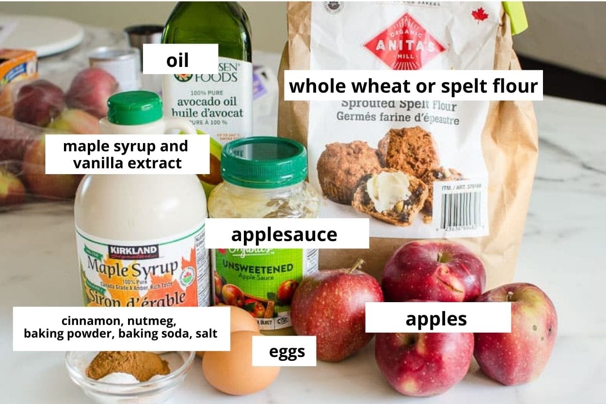 Apples, applesauce, whole wheat flour, eggs, cinnamon, nutmeg, maple syrup, vanilla extract, oil, baking powder, baking soda, salt. 