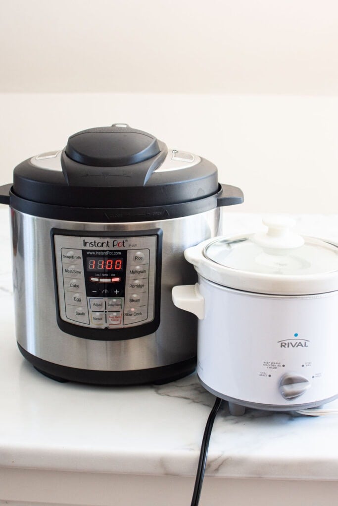 instant pot and slow cooker on kitchen counter
